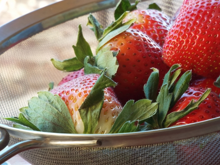 Berries in mesh strainer
