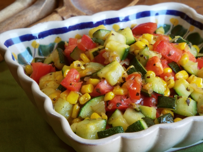 Sautéed Zucchini with Corn and Tomatoes in a Mexican pottery dish.