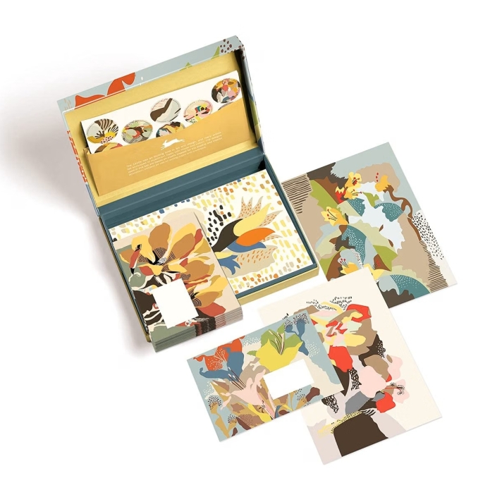 1920s Art Deco letter writing set with patterned paper, cards, envelopes, and stickers.