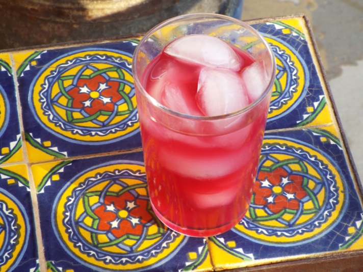 Blueberry limeade with ice and fresh lime.
